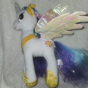White Unicorn Plush with Iridescent Wings and Purple-Blue Mane